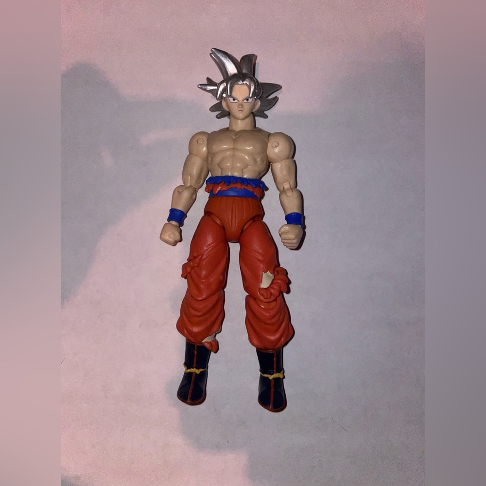 Dragon Ball Super Evolve - 5" Goku Ultra Instinct Action Figure